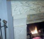 Fireplace of Lemons:cladding in listel Etrusca stone and beam in travertine.